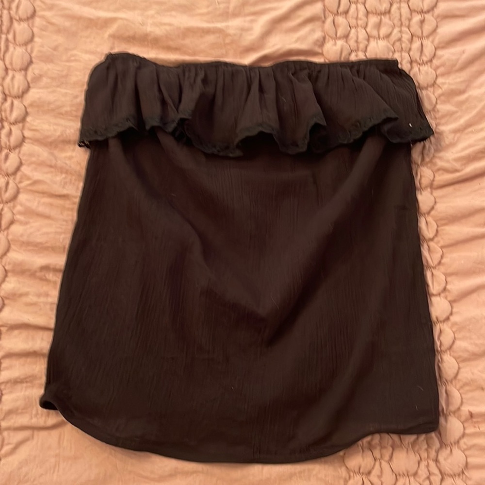 Sheer black blouse, lightly worn